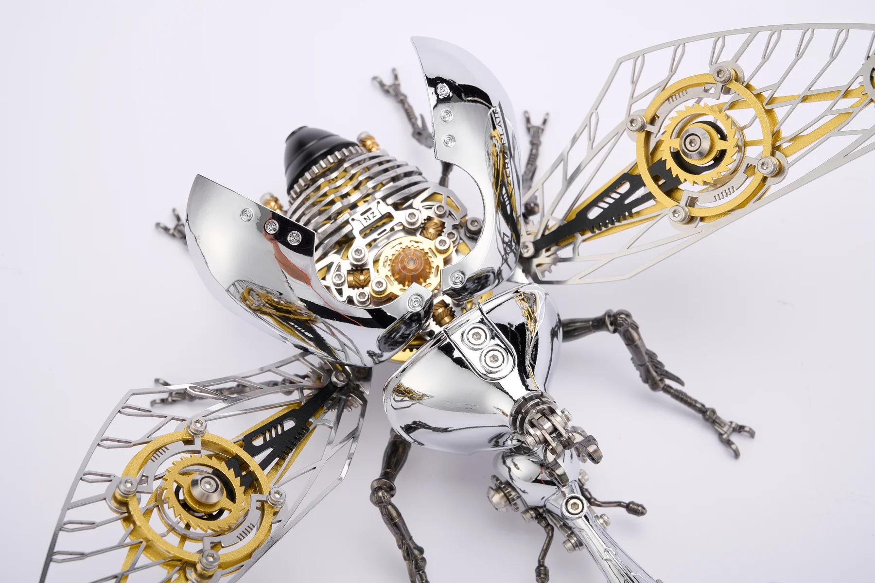 Mechanical core, gold rings and openwork wings of the Rhinoceros Beetle